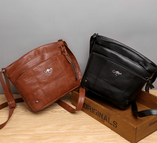 Vintage Leather Shoulder Bag with Adjustable Strap and Pockets